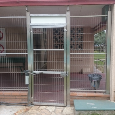 Puerta entrada comunidad inox