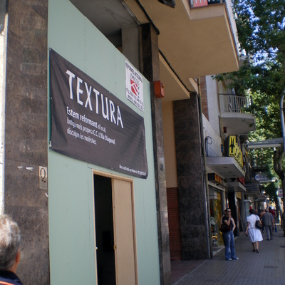 Rehabilitación fachada tienda TEXTURA