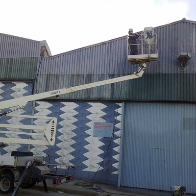 reparant coberta i façana de un local