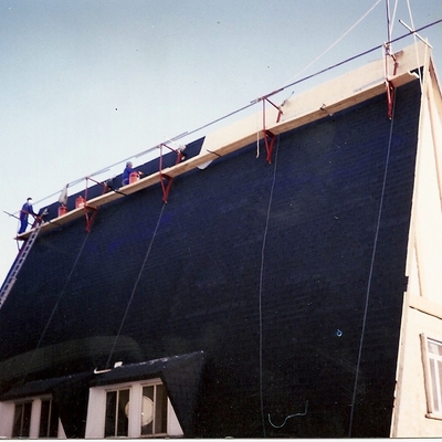 Tejado casi terminado colocando tegola americana