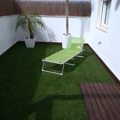 terraza con ipe y cesped