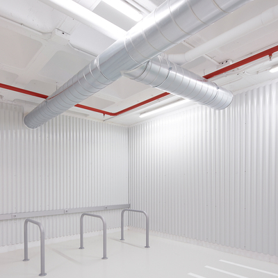 Reconversión de unos trasteros en aparcamiento para vehículos ligeros en un edificio de oficinas propiedad de Inmobiliaria Colonial.