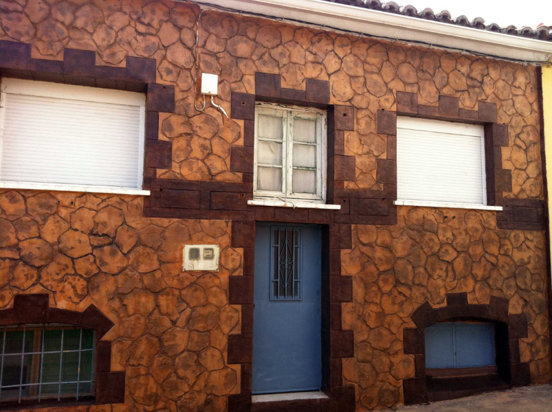 Fachada en monocapa impresa imitacion piedra