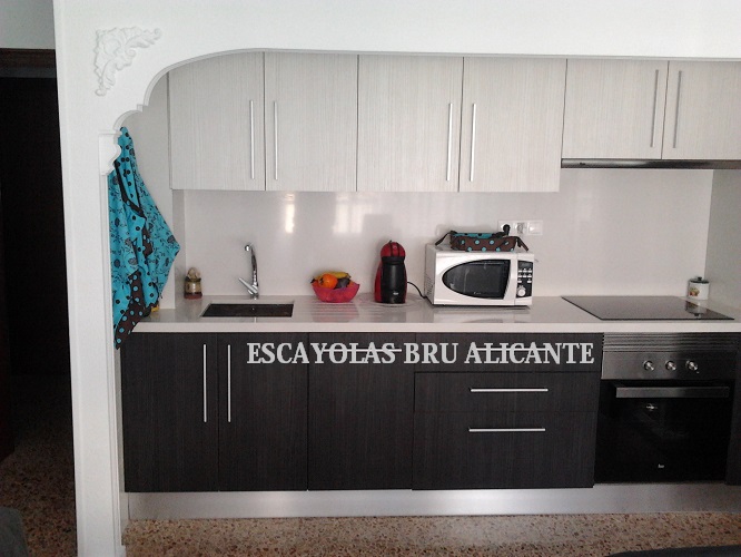 retirar puerta de cocina e instalación de arco de escayola decorativ o a medida