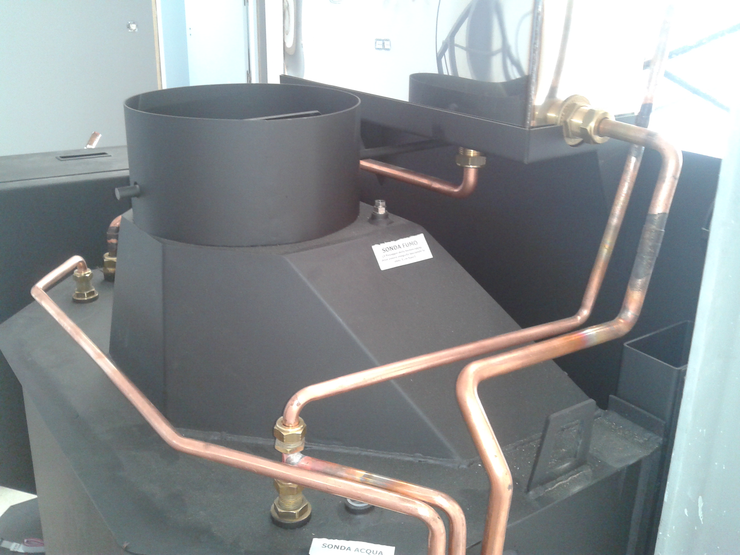 Estufa de leña conectada a radiadores