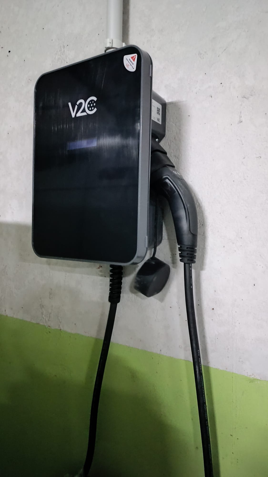 V2C Trydan en garaje comunitario