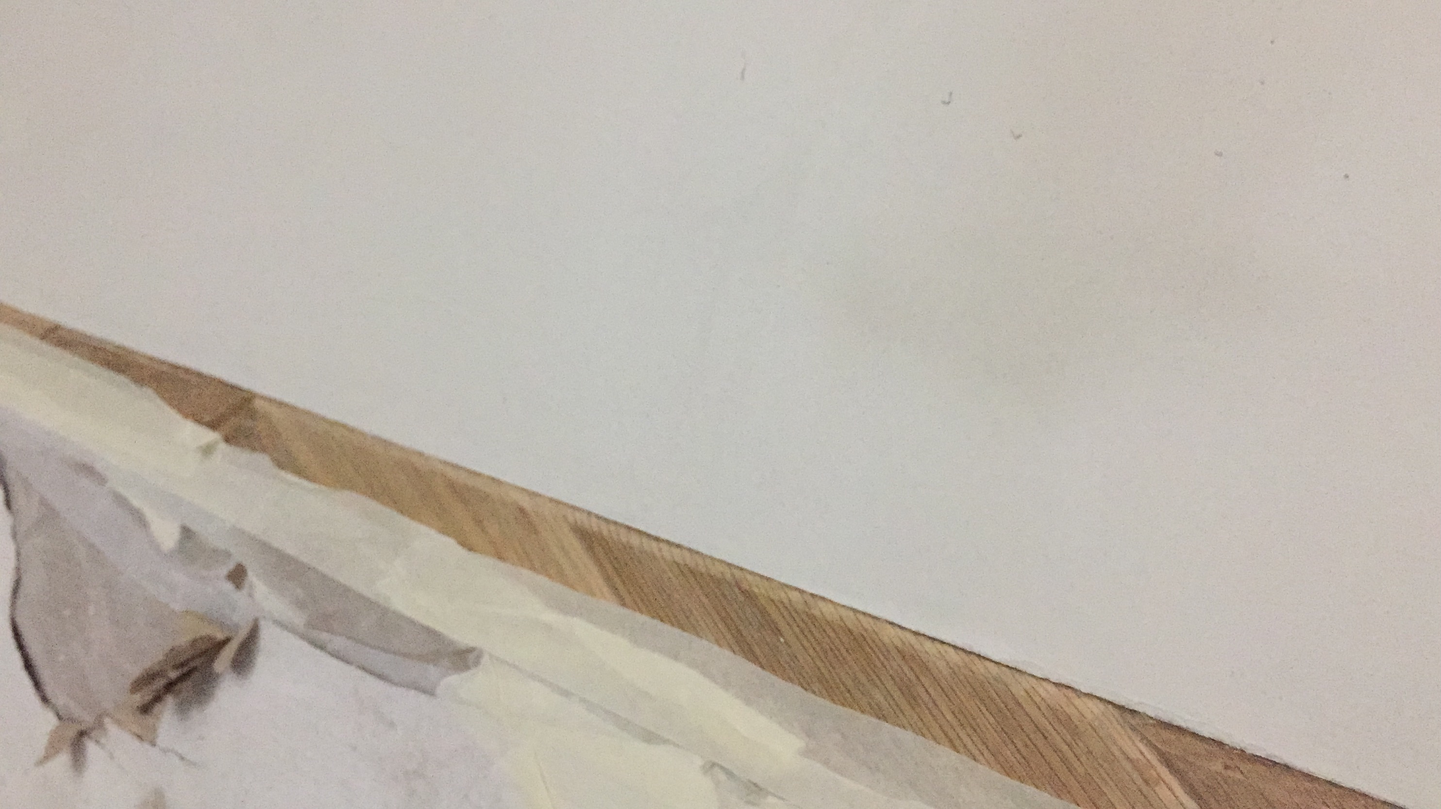 Detalle acabado microcemento parqué