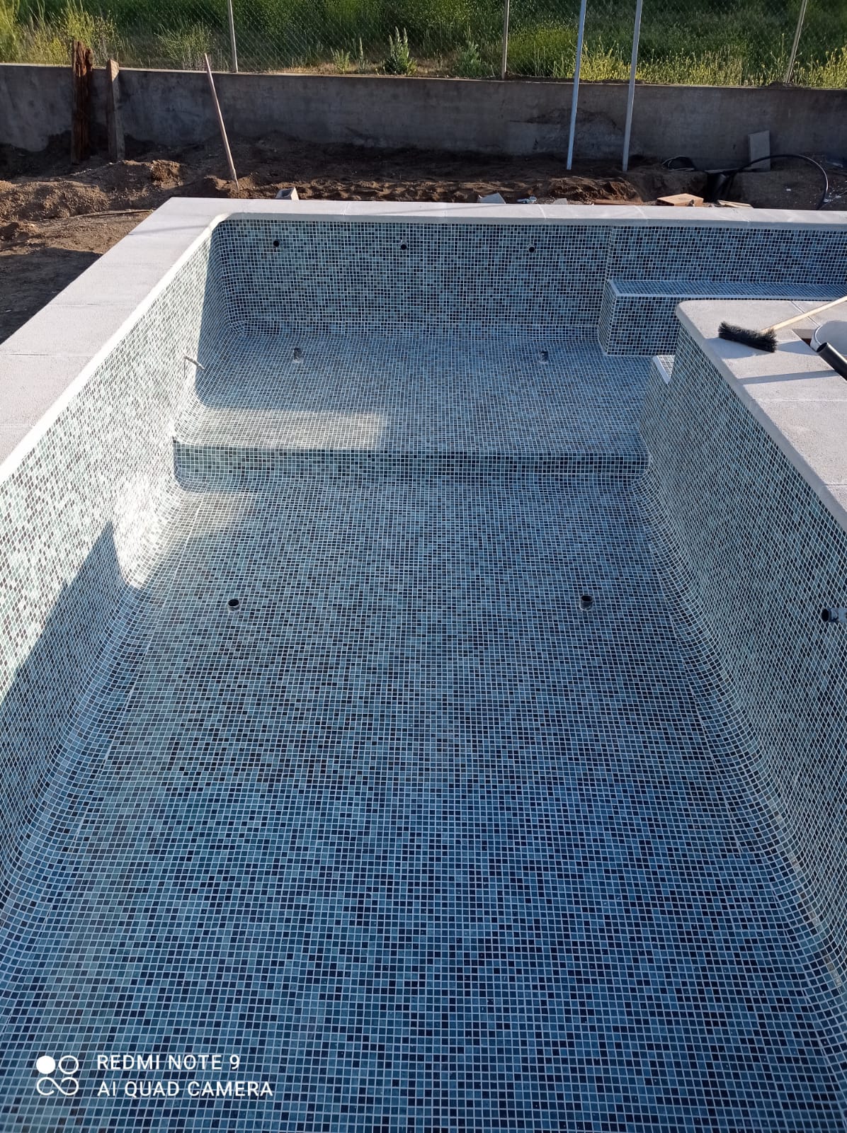 Piscina con entrada lateral