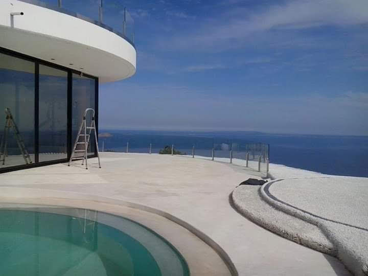 Pintura de fachada, aluminios y microcemento