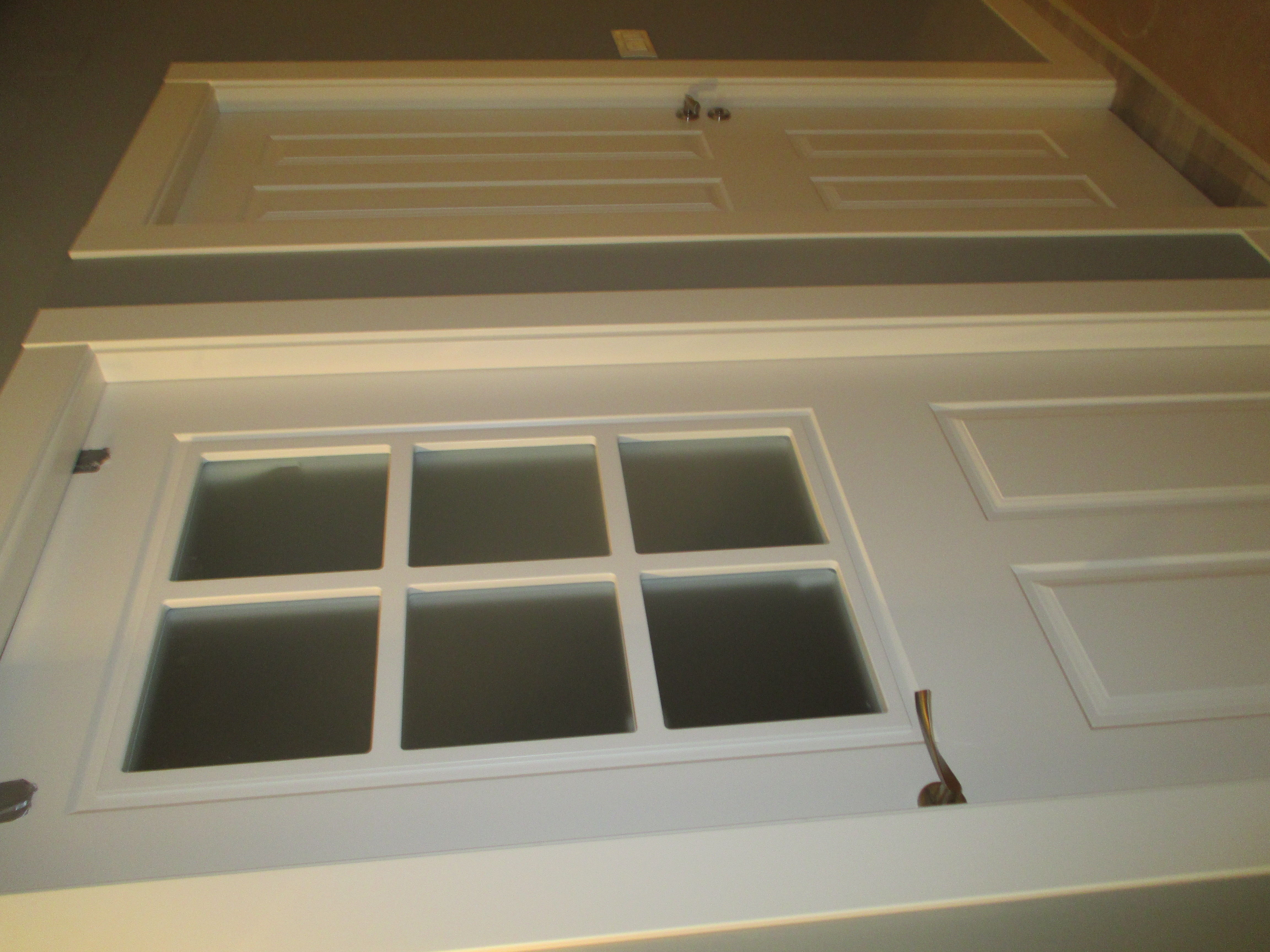 Conjunto puerta vidriera y puerta ciega