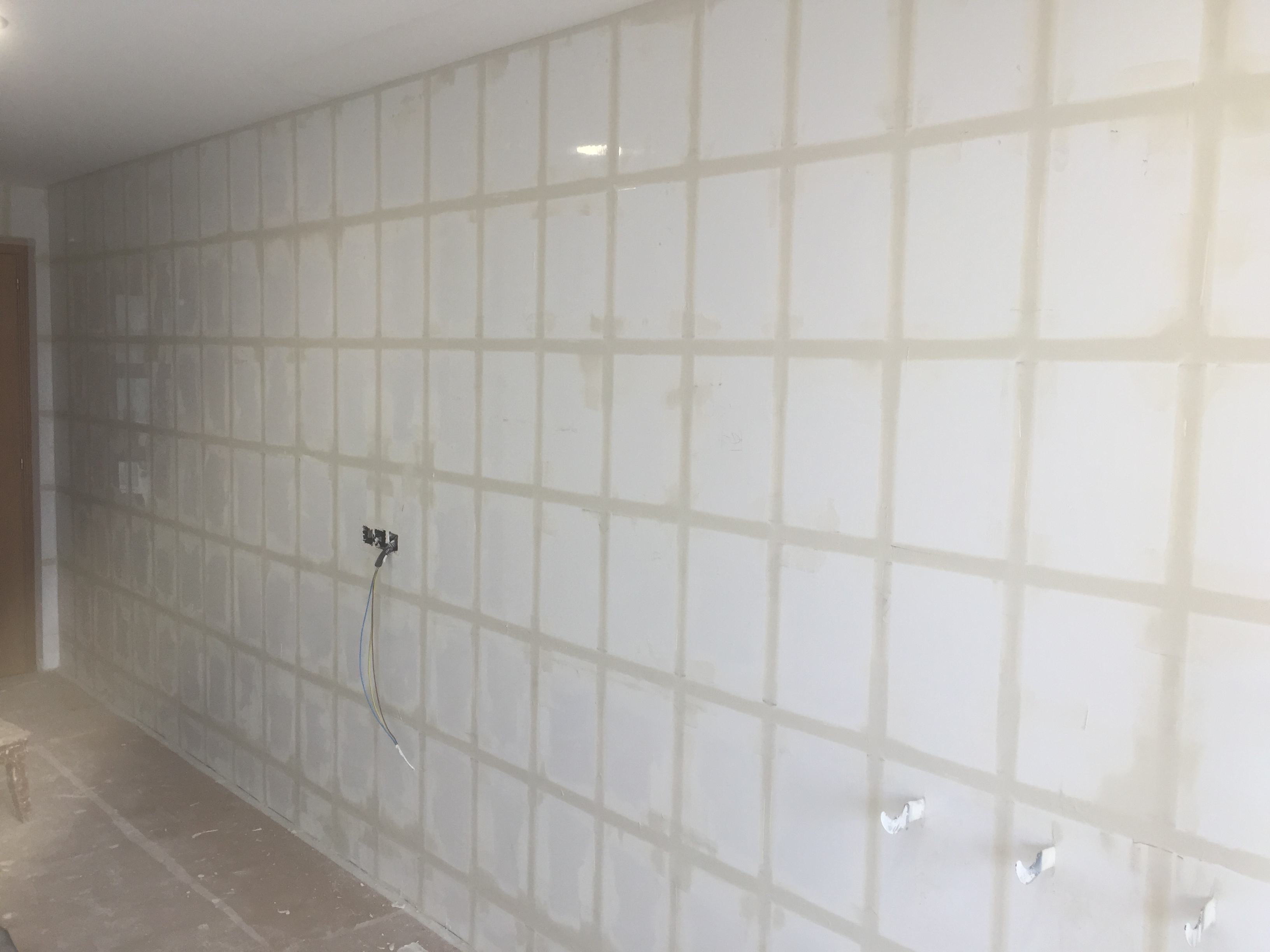 Tapado de juntas de baldosa (previo a la colocación de la malla)