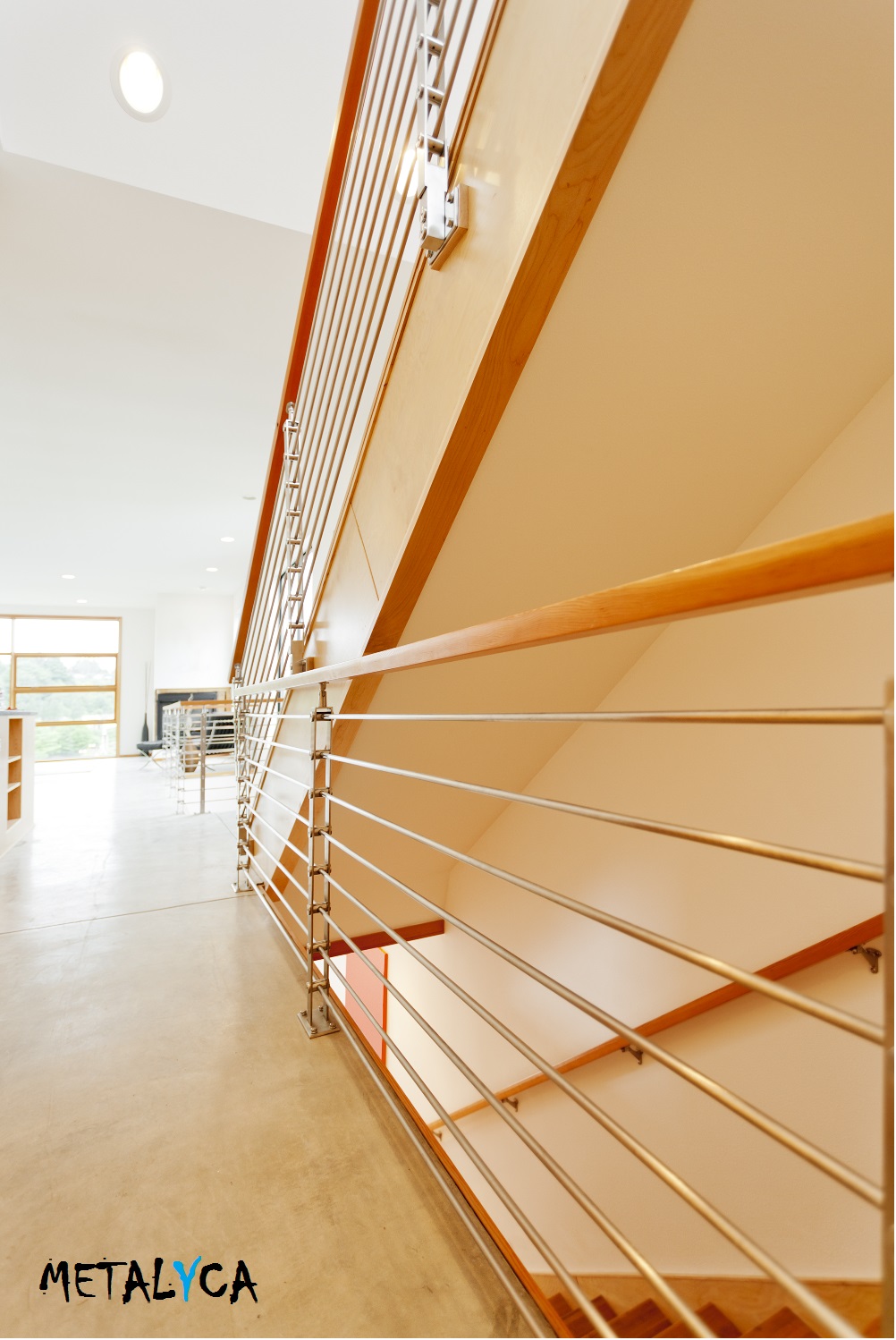 Barandilla de acero inoxidable y madera