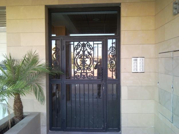 puerta de entrada forja-cristal