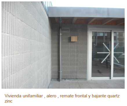 Vivienda unifamiliar, alero, remate frontal y bajante quartz zinc
