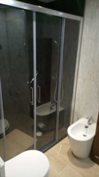 revestimiento en ducha con placas gran formato