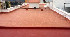 CUBIERTA ACABADO EN RASILLA Y CAUCHO