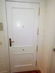 Puerta de entrada lacada en blanco
