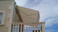 toldo de brazo invisible