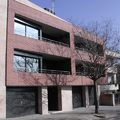 Edificio de viviendas, locales comerciales y aparcamiento.