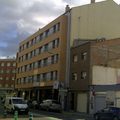 Edificio de viviendas, locales comerciales y aparcamiento.