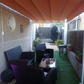 Pérgola con muebles 