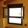 Ventana con fijo inferior abierta dos hojas