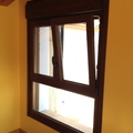 Ventana con fijo inferior oscilobatiente