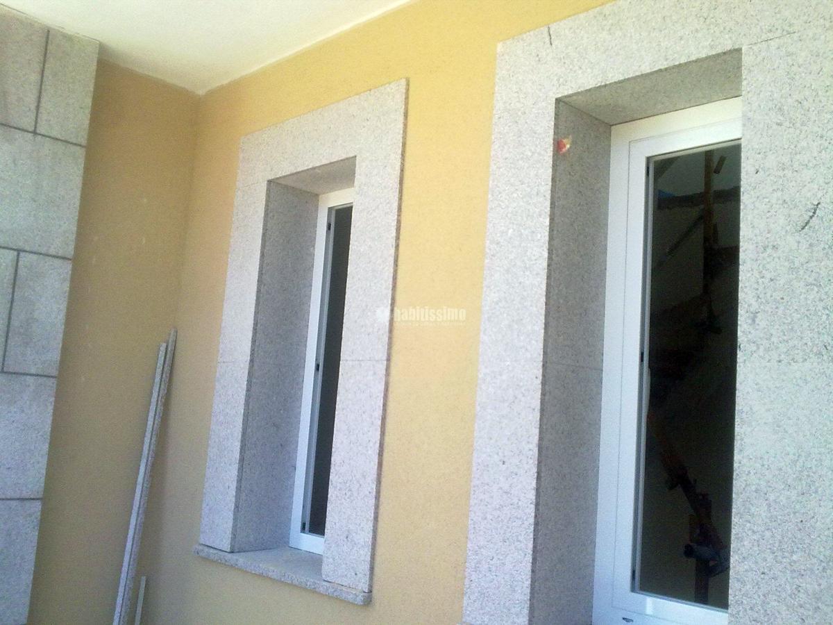 Revestimientos en monocapa raspado en chalet