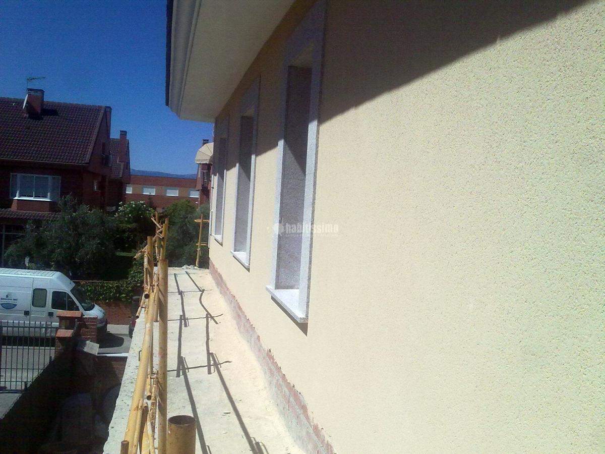 Revestimientos en monocapa raspado en chalet