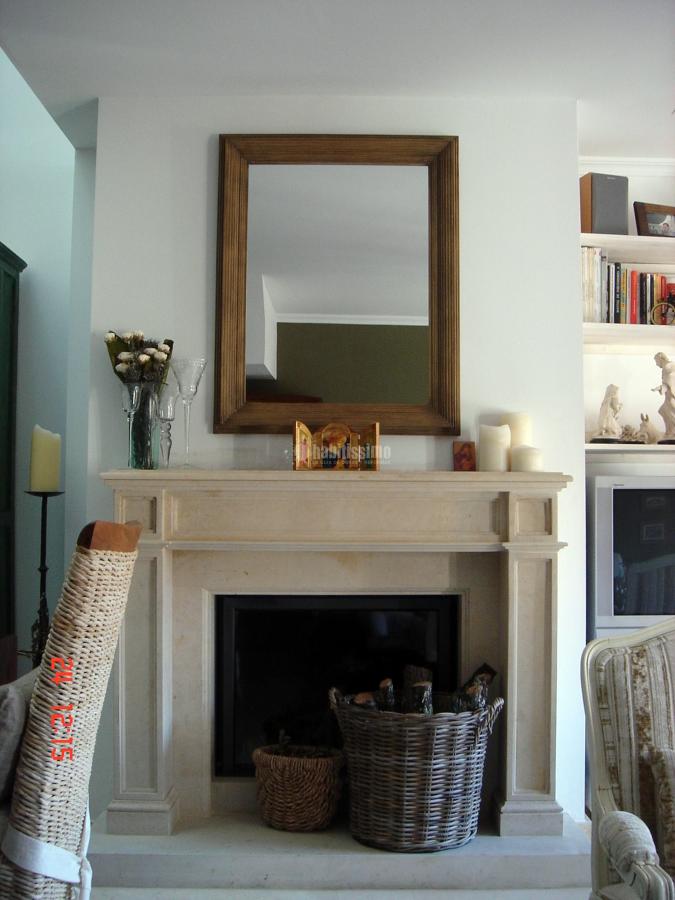 Reforma vivienda con chimenea