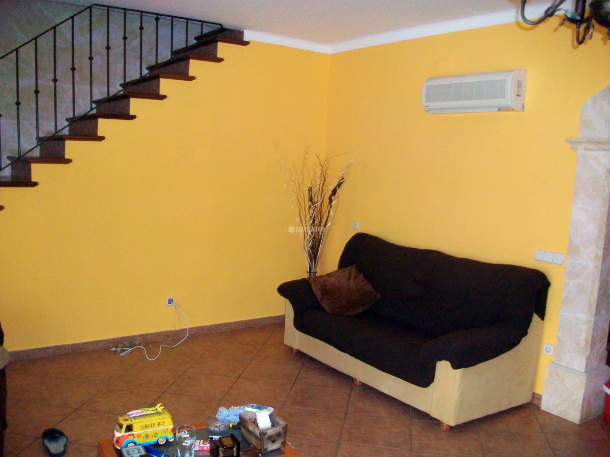 Alisado y pintado de salon con colocación de arco