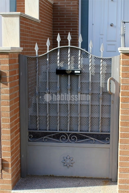Puertas batientes de hierro