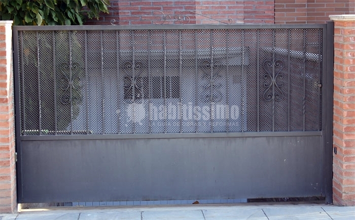 Puertas batientes de hierro