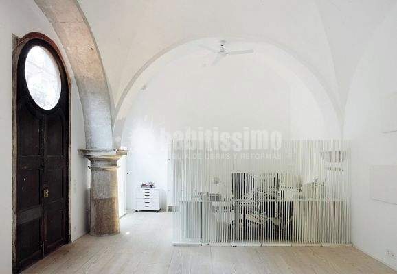 Rehabilitar una casa con un antiguo claustro. Barcelona