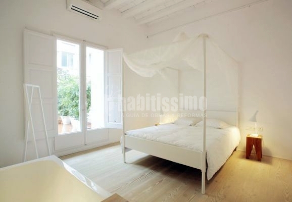 Rehabilitar una casa con un antiguo claustro. Barcelona