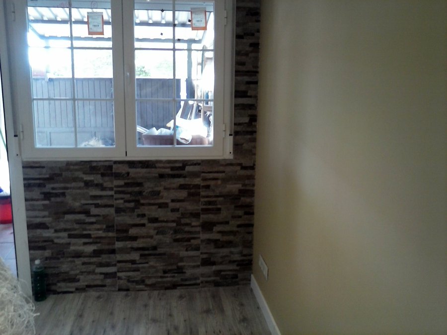 Adecuación de garaje en sala de estar y baño