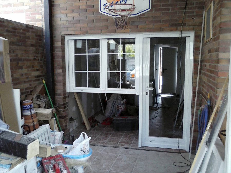 Adecuación de garaje en sala de estar y baño