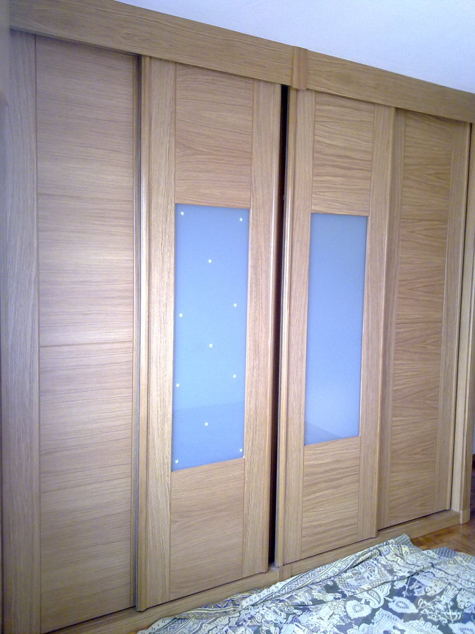 Armario corredera de 4 puertas