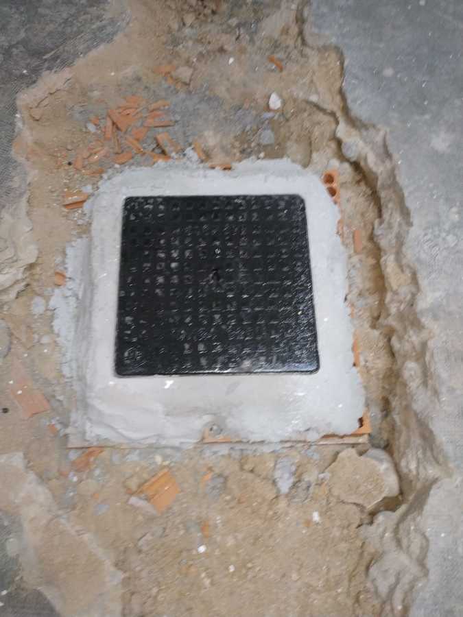 Arqueta con nueva tapa de hierro fundido