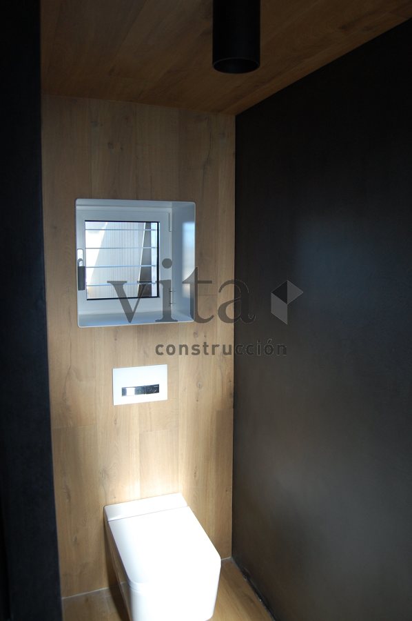 Aseo en microcemento y roble