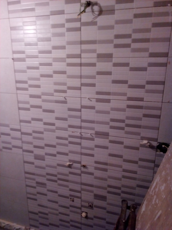 Azulejo frente del lavavo.