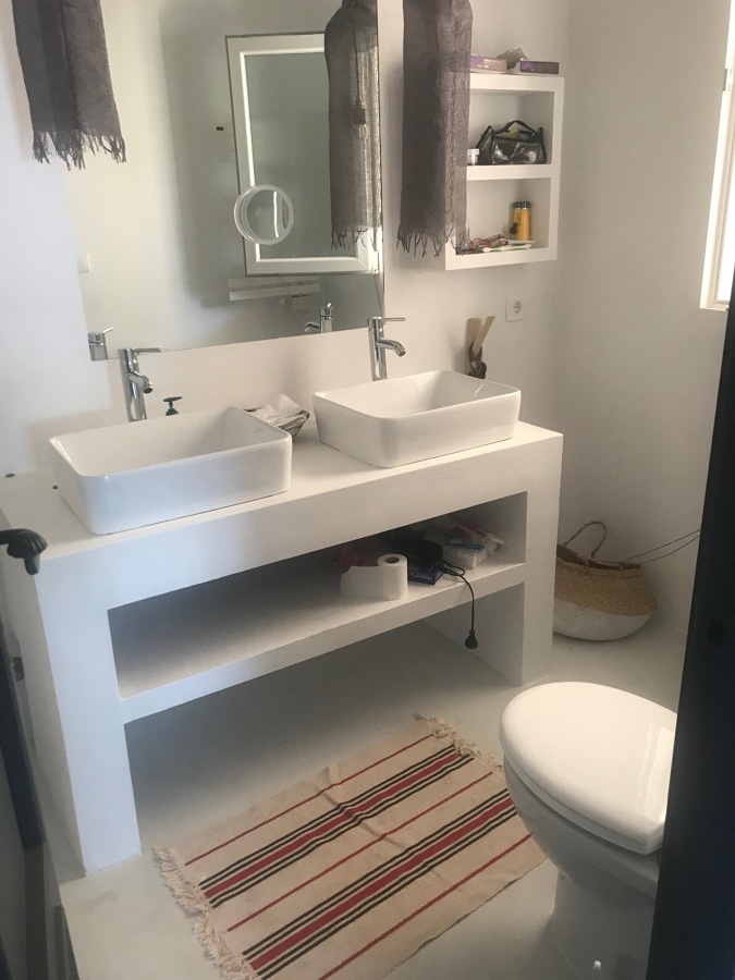 Baño MicroCemento blanco