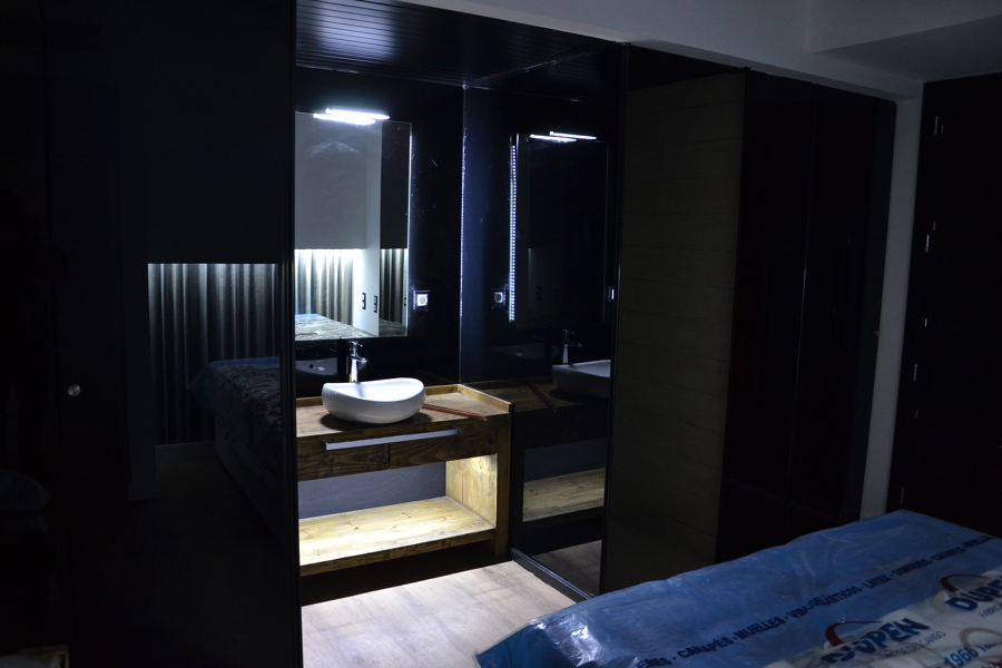 Baños integrados en habitaciones con cristal