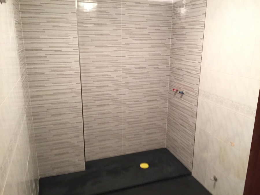 Cambio de azulejo con perfilería de inox