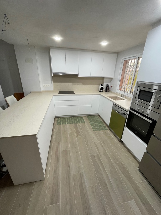 Cocina abierta a salón.