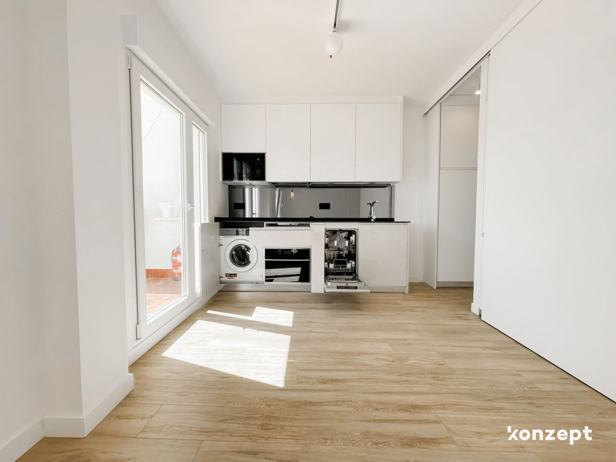 cocina blanca electrodomésticos integrados