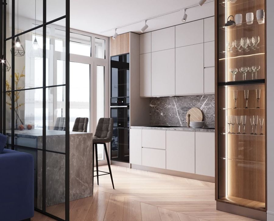 Cocina moderna con pared fija de hierro y cristal