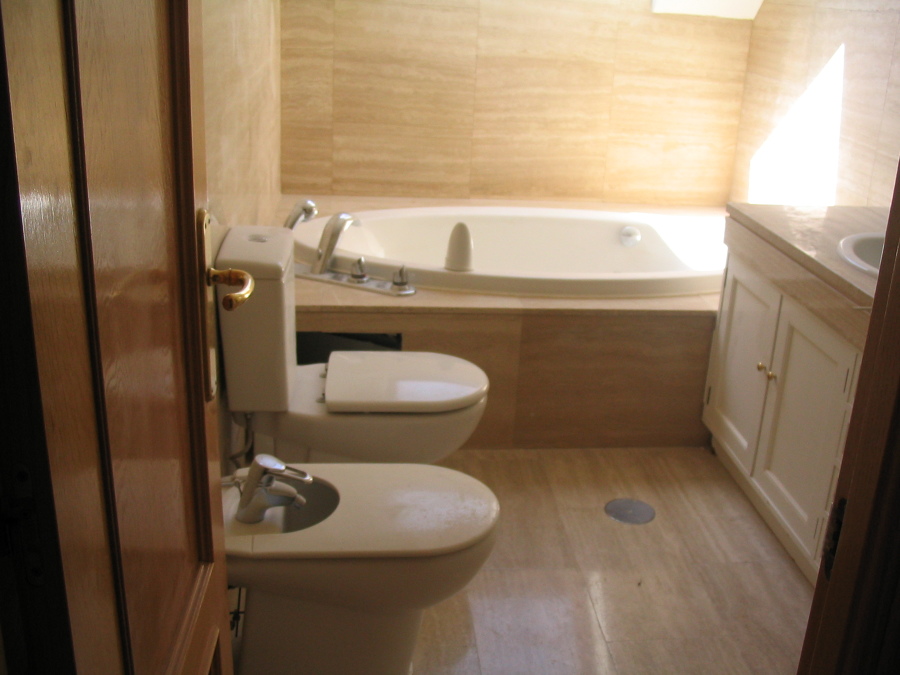 Colocacion de marmol y bañera de hidromasajes 