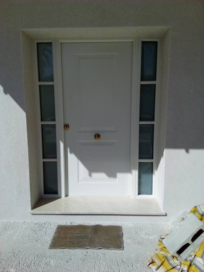 COLOCACION DE PUERTA DE SEGURIDAD