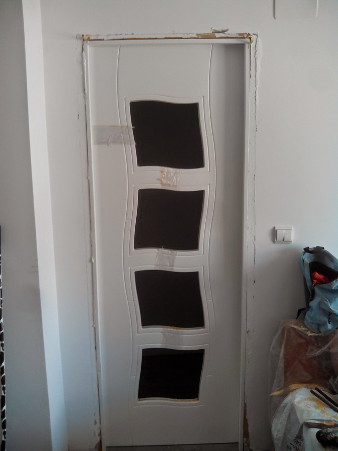 Colocacion de puerta sobre marco viejo